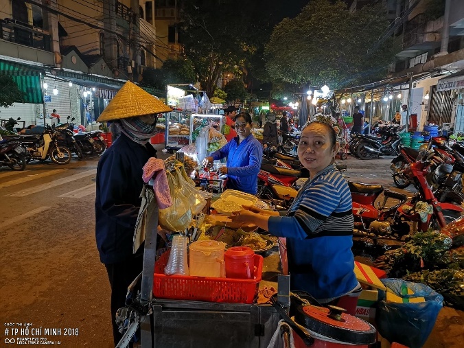 Muôn màu cuộc sống mưu sinh qua bộ ảnh “TP.HCM 2018” - Ảnh 7. Muôn màu cuộc sống mưu sinh qua bộ ảnh “TP.HCM 2018” - Ảnh 7.