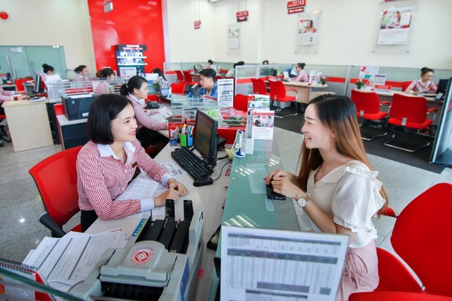 Bất chấp thách thức Covid-19, ngành ngân hàng bứt phá về đích sớm - Ảnh 1.