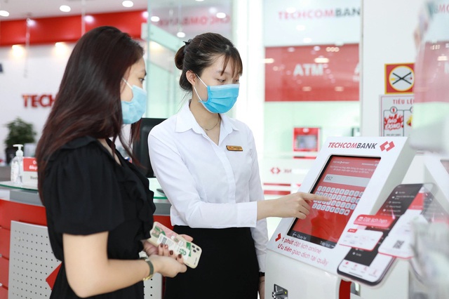 Techcombank - Ngân hàng xuất sắc nhất 2021, dẫn đầu hoạt động thanh toán nội địa - Ảnh 2.