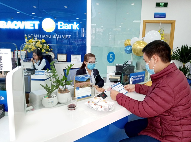 BAOVIET Bank tri ân khách hàng nhân dịp Tết Nguyên đán 2022 - Ảnh 1.