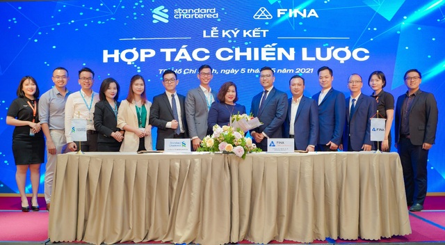 FINA hợp tác chiến lược  toàn diện cùng Standard Chartered Việt Nam - Ảnh 2.
