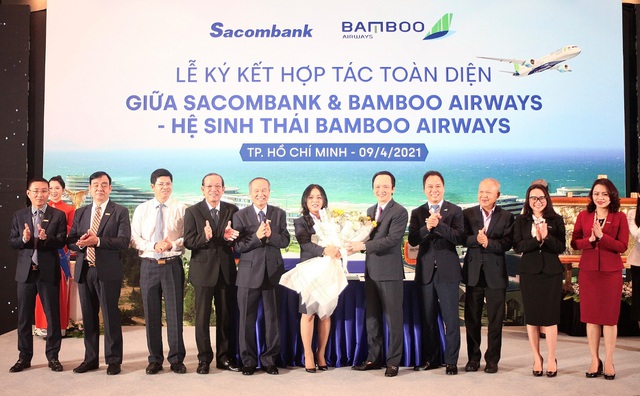 Chung tầm nhìn tiên phong chuyển đổi số, Bamboo Airways và Sacombank hợp tác toàn diện - Ảnh 2.