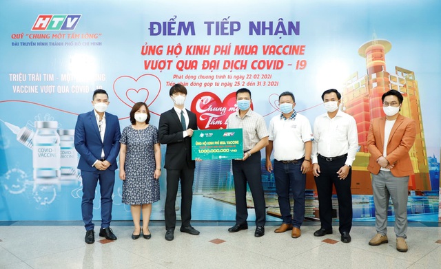 Van Phuc Group ủng hộ 100 tấn gạo, 2.000 quần áo bảo hộ chống dịch Covid-19 - Ảnh 2.