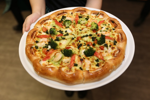 Tăng tốc dẫn đầu, The Pizza Company thay đổi hoàn toàn diện mạo mới và ồ ạt khai trương liên tiếp 10 nhà hàng - Ảnh 2.