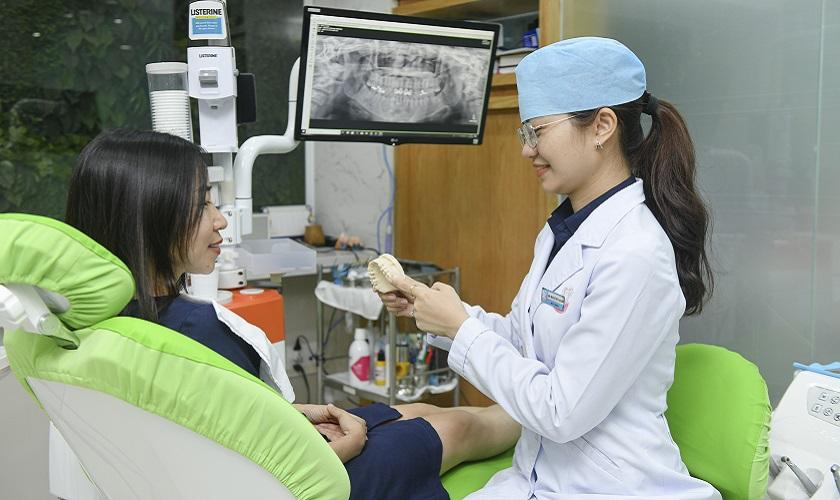 Chinh phục nụ cười hoàn mỹ với phương pháp trồng răng sứ - Ảnh 2.
