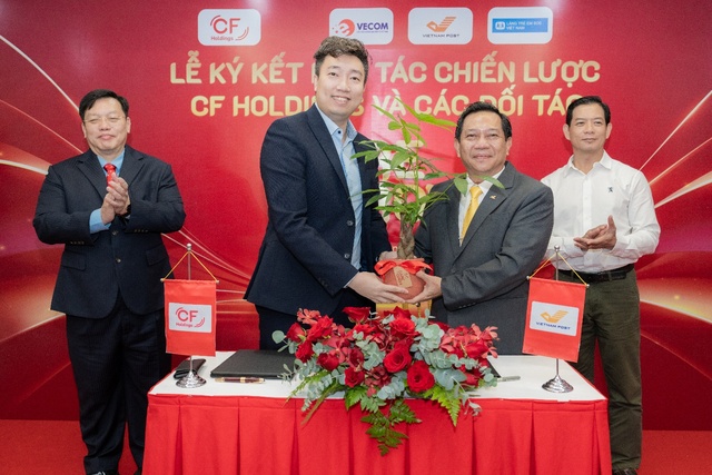 CF Holdings ký kết hợp tác chiến lược với VECOM, VNPost và Làng trẻ em SOS Việt Nam - Ảnh 2.