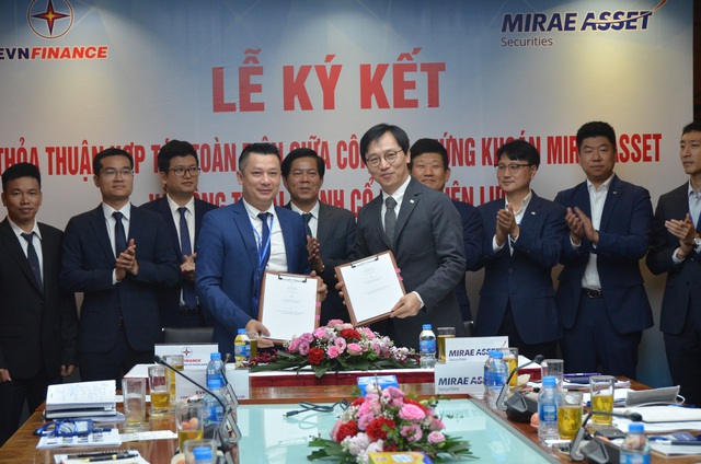 Lễ ký kết hợp tác chiến lược giữa Công ty chứng khoán Mirae Asset và Công ty Tài chính Cổ phần Điện lực - Ảnh 1.