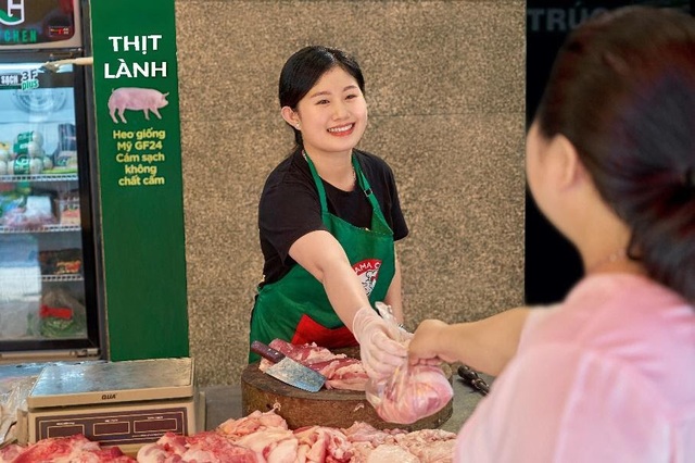 Yên tâm khi mua thịt có thương hiệu tại chợ truyền thống - Ảnh 1.