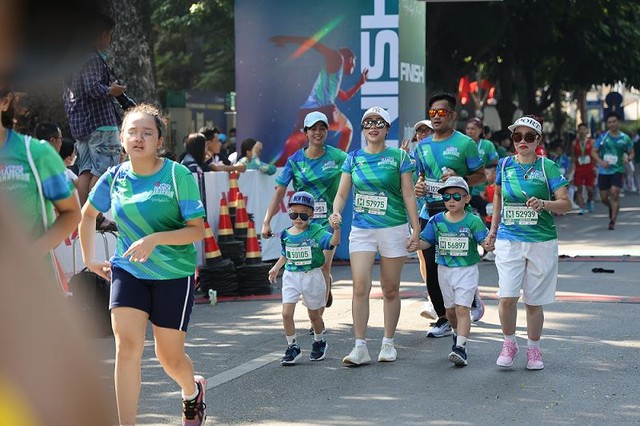 Những vận động viên gây ấn tượng đặc biệt tại VPBank Hanoi Marathon 2022 - Ảnh 11.