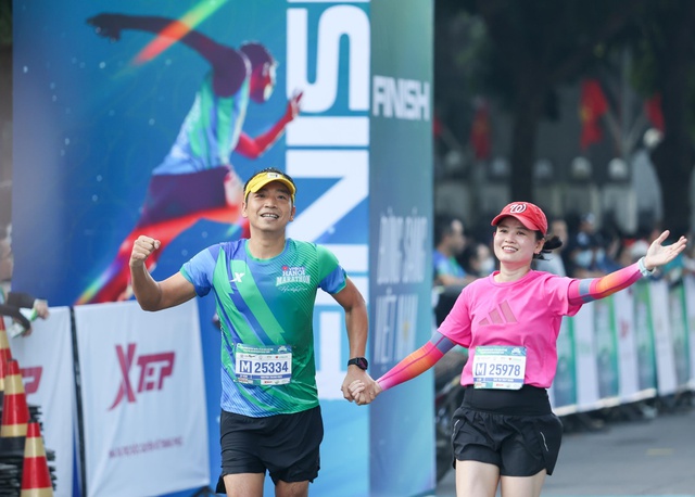 Những vận động viên gây ấn tượng đặc biệt tại VPBank Hanoi Marathon 2022 - Ảnh 10.