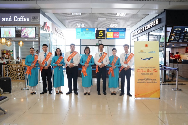 Vietnam Airlines hưởng ứng chiến dịch Tô cam chống bạo lực giới đầy ý nghĩa - Ảnh 1.