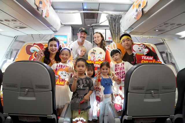 Tận hưởng m&ugrave;a Tết đo&agrave;n vi&ecirc;n c&ugrave;ng Vietjet v&agrave; m&aacute;y bay Amy khắp bốn phương - Ảnh 1.