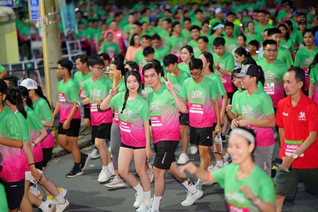 12.000 “chân chạy” phủ rợp sắc hồng rực rỡ giữa lòng Đồng Tháp- Ảnh 6.