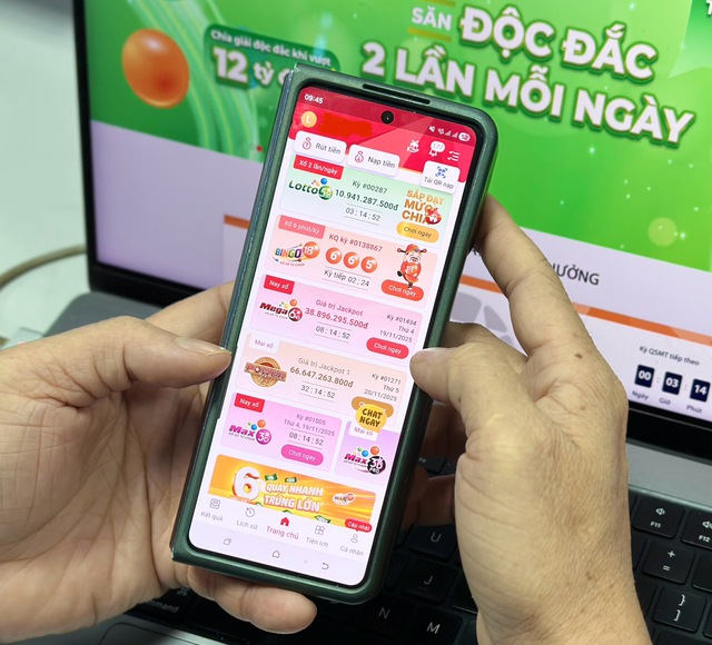 Giải m&atilde; sức h&uacute;t của tr&agrave;o lưu chơi xổ số tr&ecirc;n điện thoại - Ảnh 1.