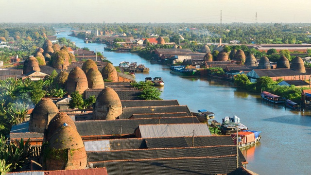 Theo dòng Cổ Chiên: Từ dòng sông mở cõi đến cách đô thị viết tiếp tương lai - Ảnh 2.