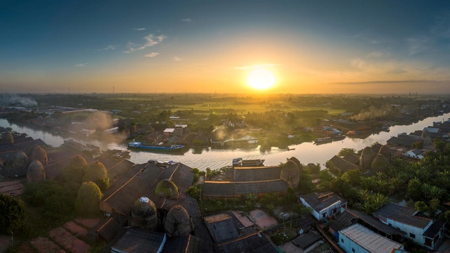 Theo dòng Cổ Chiên: Từ dòng sông mở cõi đến cách đô thị viết tiếp tương lai - Ảnh 7.