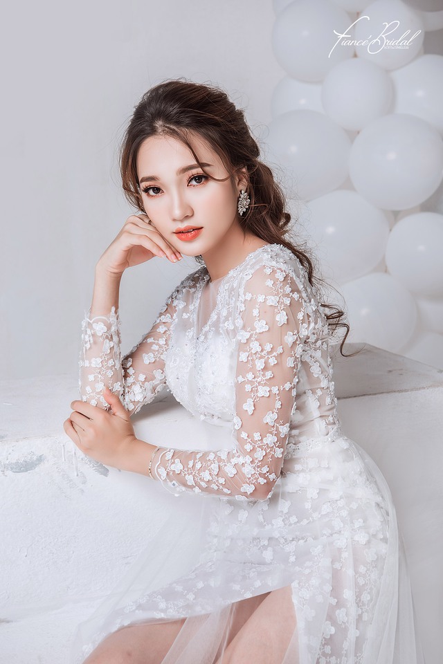 Nguyễn Ngọc Nữ - Top 10 Hoa Hậu Hoàn Vũ nổi bật cùng chiếc váy cưới nghìn đô - Ảnh 9.