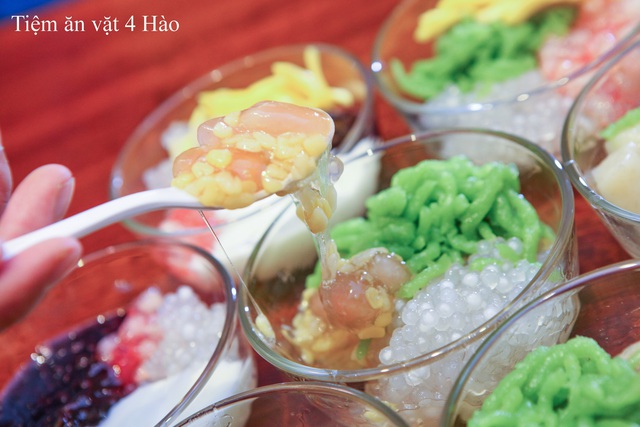 Khám phá tiệm ăn vặt 4 Hào nổi tiếng ngon “điên đảo” ở Hà Nội - Ảnh 1.